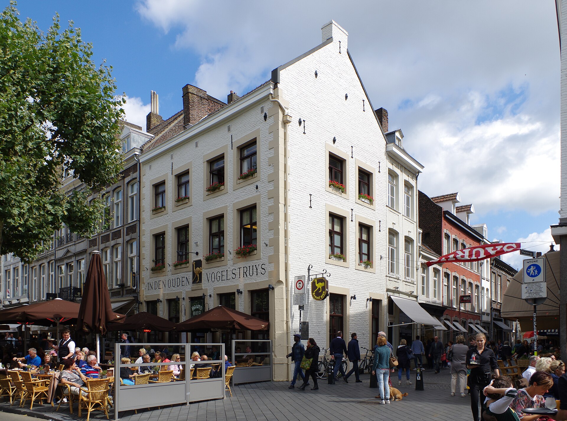 Vrijthof square in Maastricht with terraces and historic facades